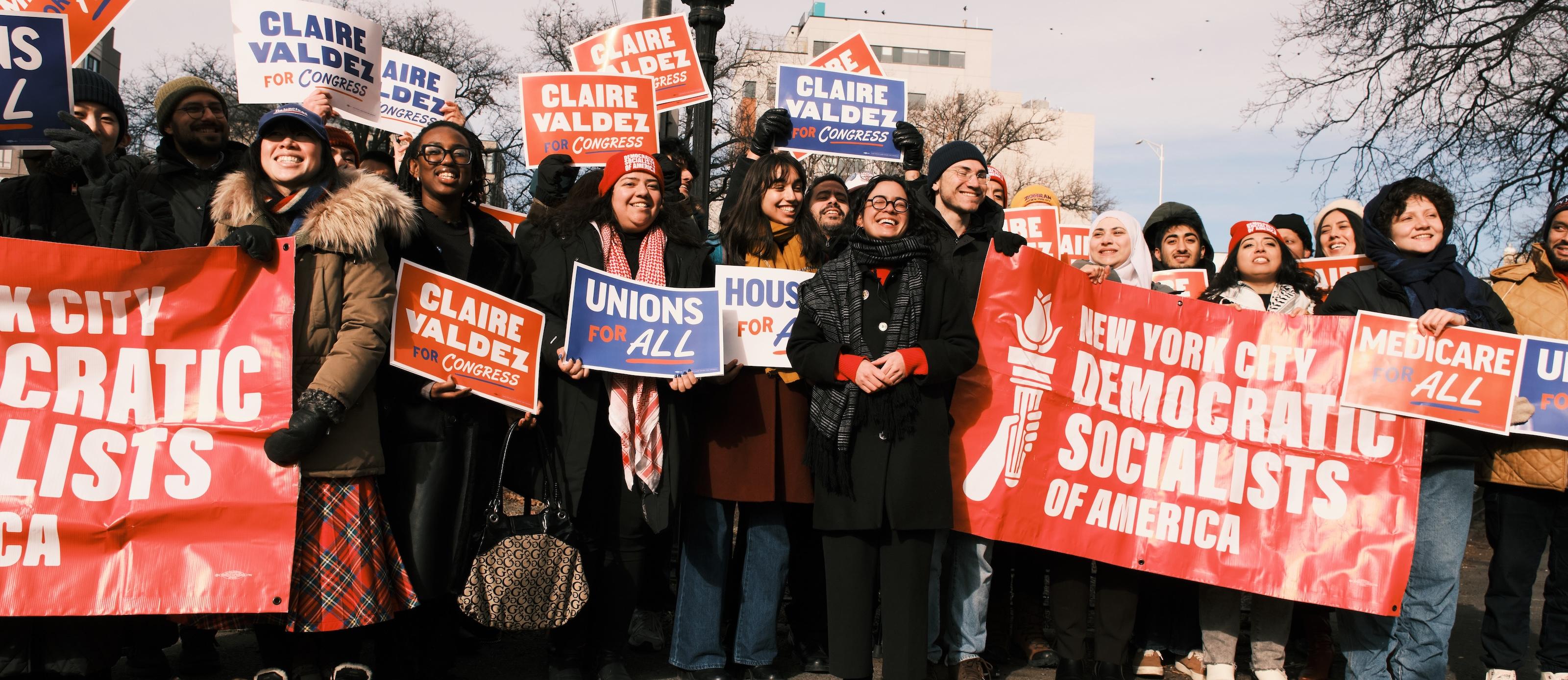 Claire Valdez stands with a crowd of supporters at her NYC DSA endorsement event
